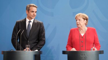 km-merkel-diloseis