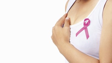 woman_holding_breast