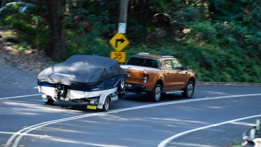 car-towing-boat